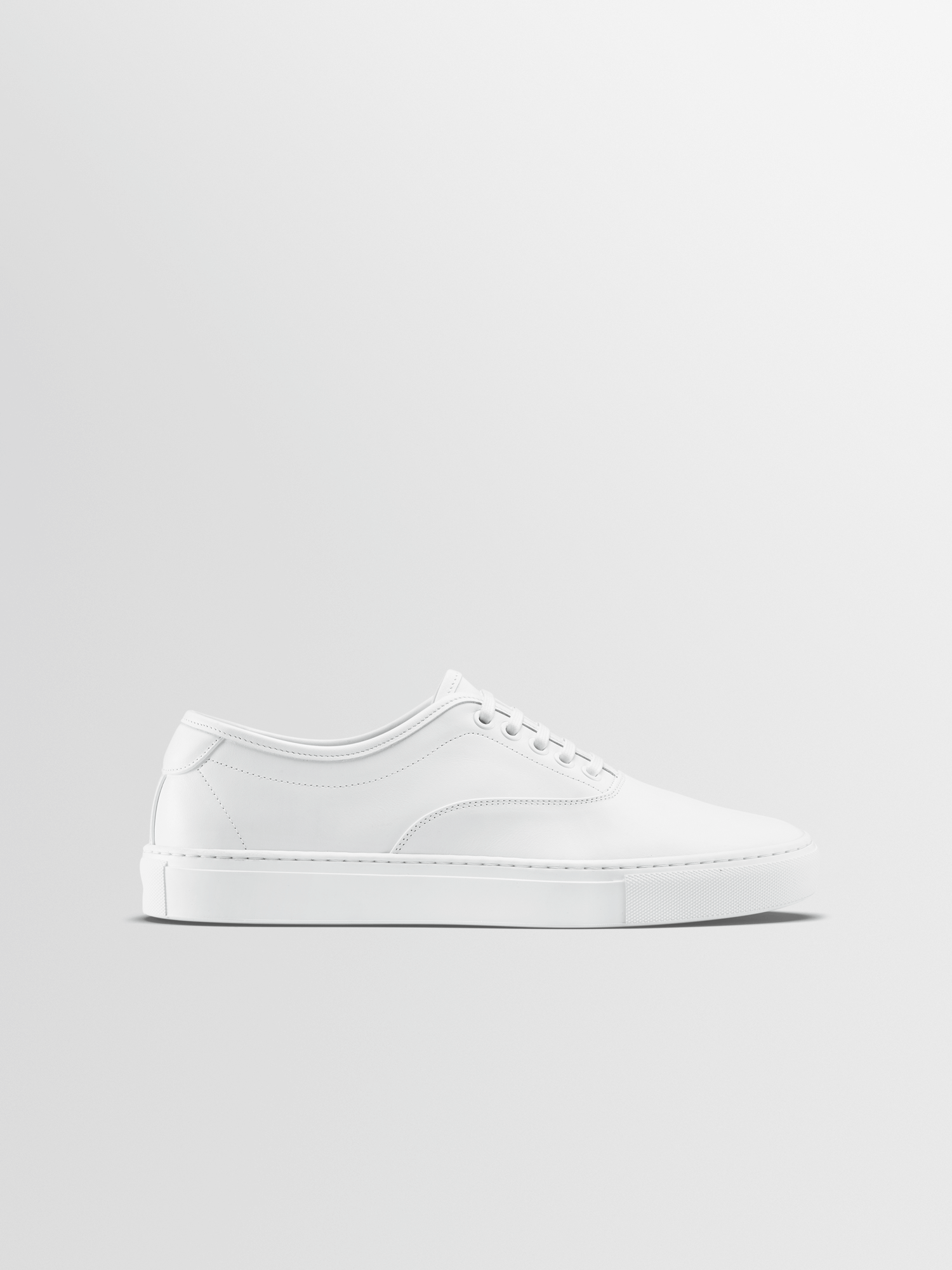 Portofino-white-1_8d4b2d4a-72bf-4ad3-b89a-2cad6cfb8a3e Portofino Leather Sneaker in Triple White - Image 1